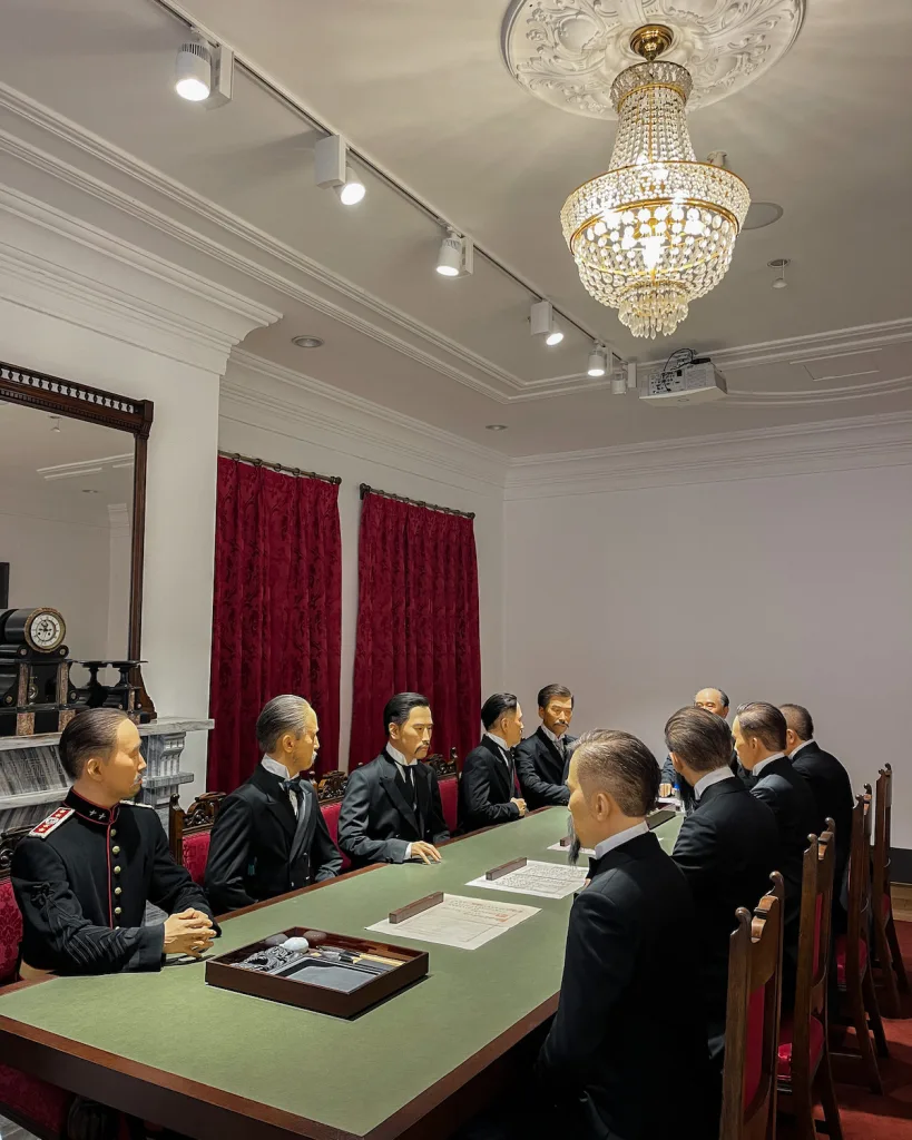 Inside Junmyeongjeon Hall at Deoksugung Palace, a lifelike diorama shows the signing of the 1905 treaty, giving visitors a vivid glimpse into the political history housed within this royal structure.